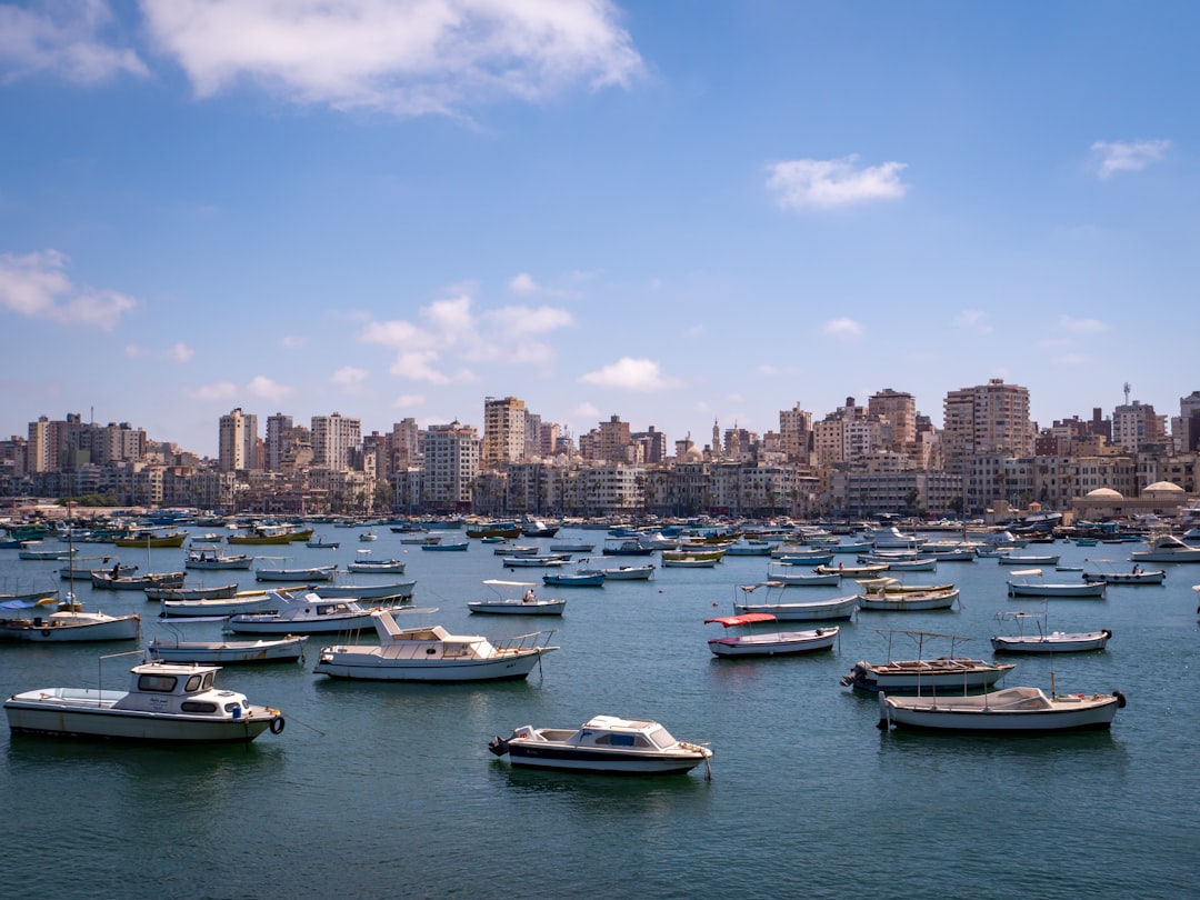 Alexandria Corniche waterfront at midday with hotels and Mediterranean sea visible
